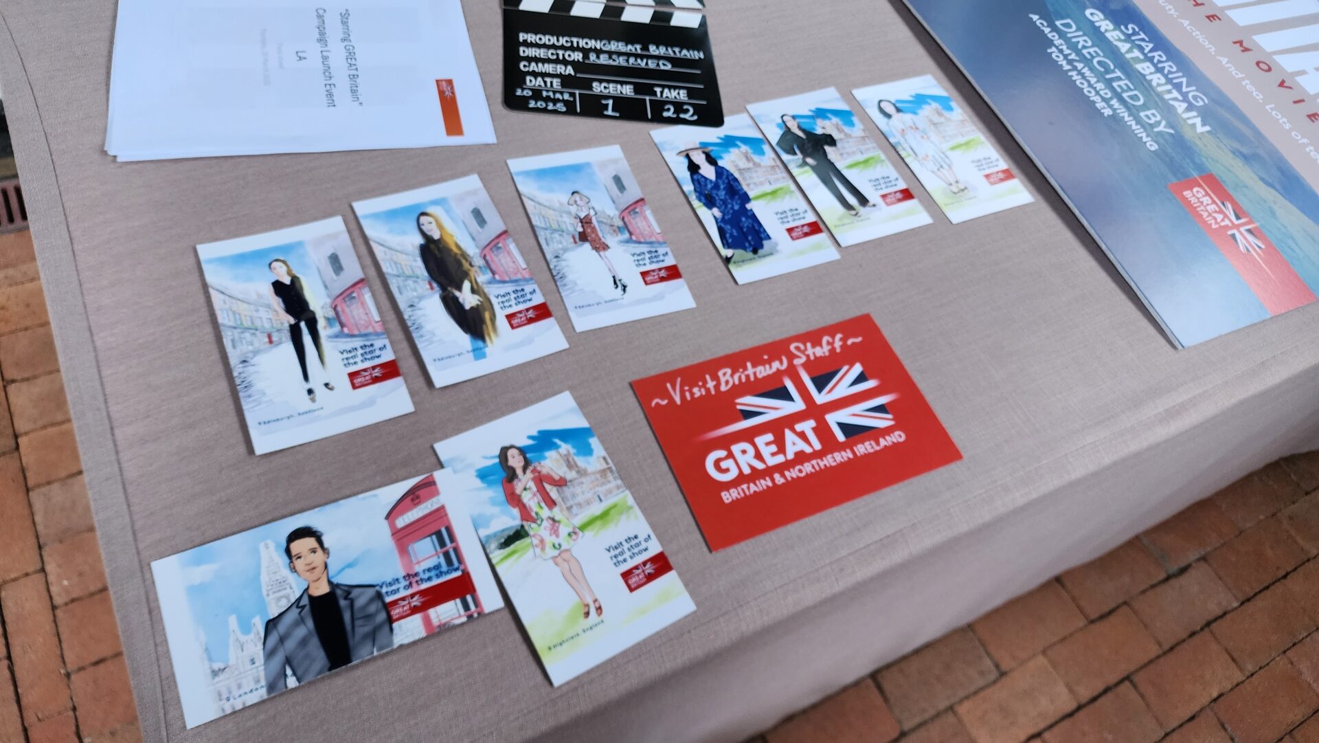 Printed fashion sketches on display at British tourism event in Los Angeles, created by live sketch artists from Drawing Booth