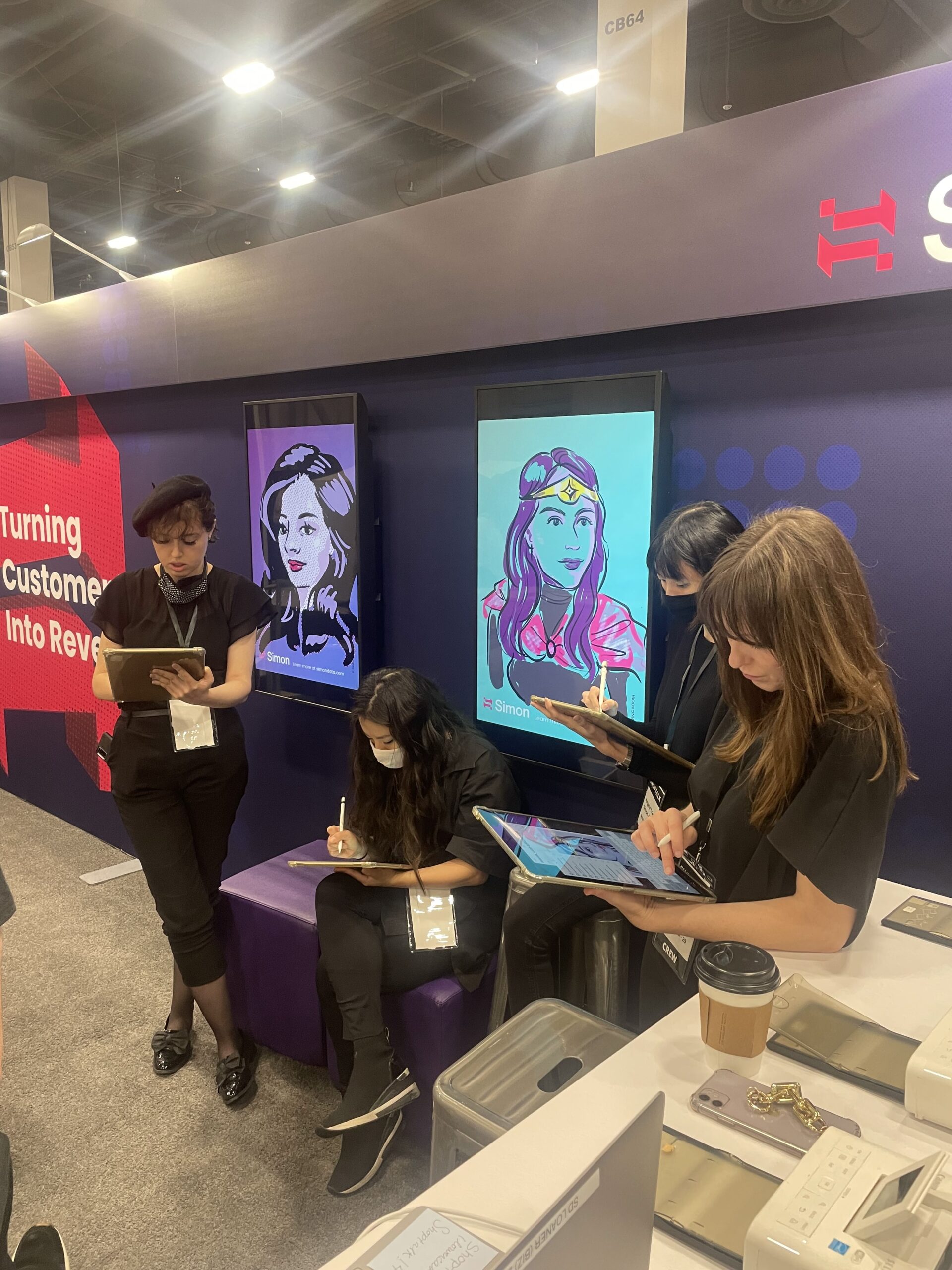 Event sketch artist drawing guests at Adobe MAX conference in Los Angeles